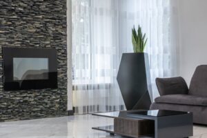Moderne Dimplex elektrische haard in sfeervol interieur met meubels.